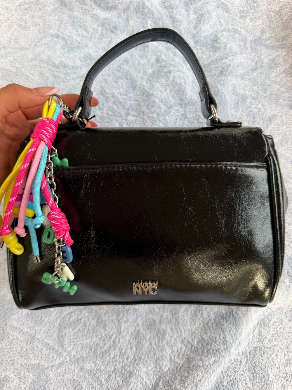 NYC Black Patent Top-Handle Satchel with Colorful Tassel Charm